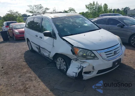 2010 Honda Odyssey Lx z USA, uszkodzony, nr VIN 5FNRL3H21AB037857